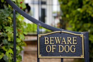 beware of dog sign to warn against dog bite attacks