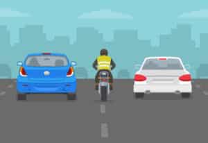 illustration of a motorcycle lane splitting