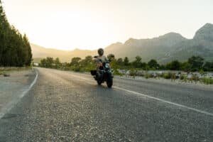 rural motorcycle rider on a mountain highway