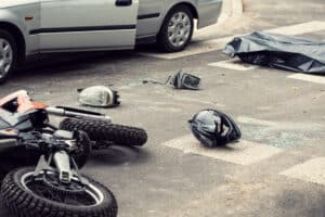 motorcycle and helmet on the road after a motorcycle accident